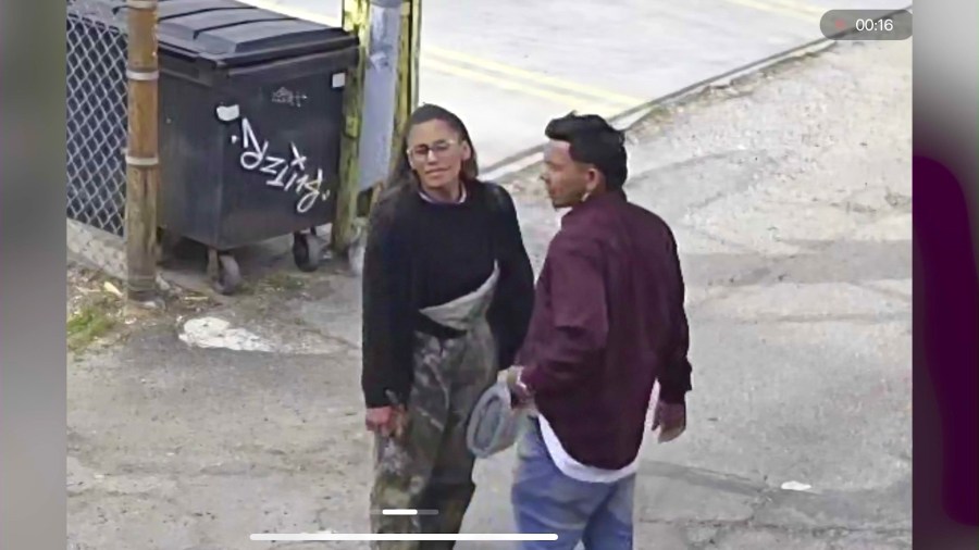 Two squatters breaking into a problem property in a Westwood neighborhood.