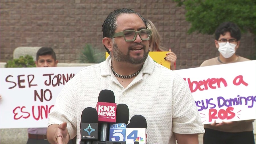 Alexis Teodoro, a Worker Rights Director with the Pomona Economic Opportunity Center, spoke at a rally and press conference that was held outside Pomona City Hall on May 6, 2025. (KTLA)