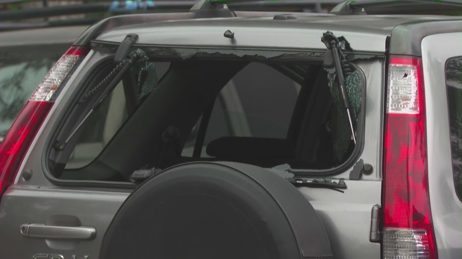 A Honda SUV with a shattered back windshield connected to a fatal shooting in the city of Orange on May 6, 2025. (KTLA)