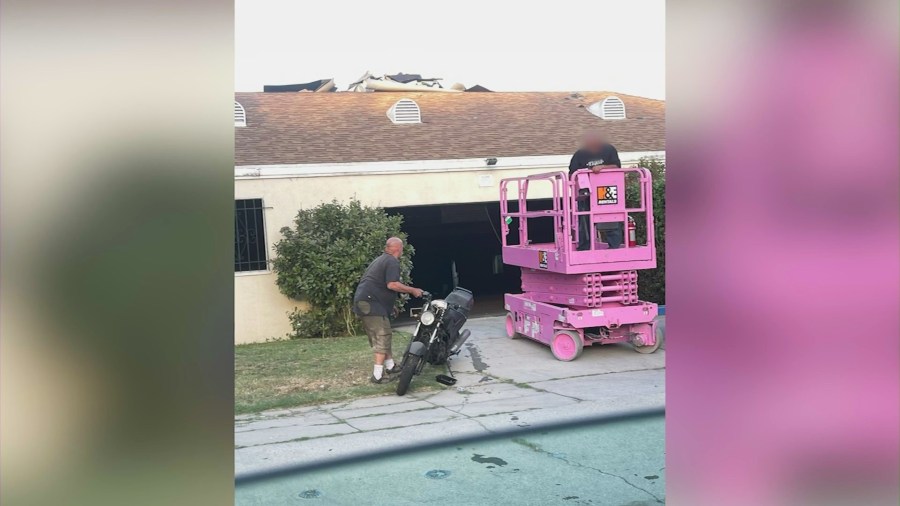 The male suspect (on left) returned to the garage of a Hollywood home that was under construction before emerging with a power saw on May 13, 2025.