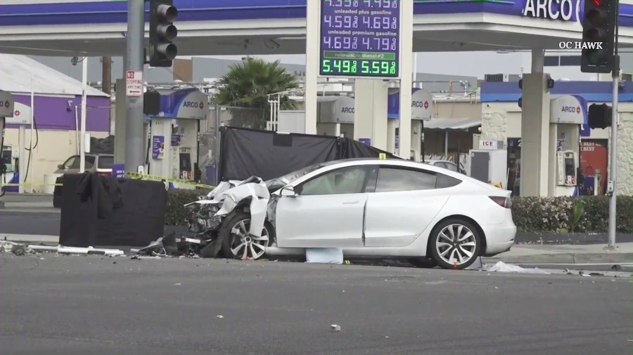 Two people were killed after a driver in a Tesla Model 3 ran a red light and crashed into a bus in Orange County on April 12, 2025. (OC Hawk)