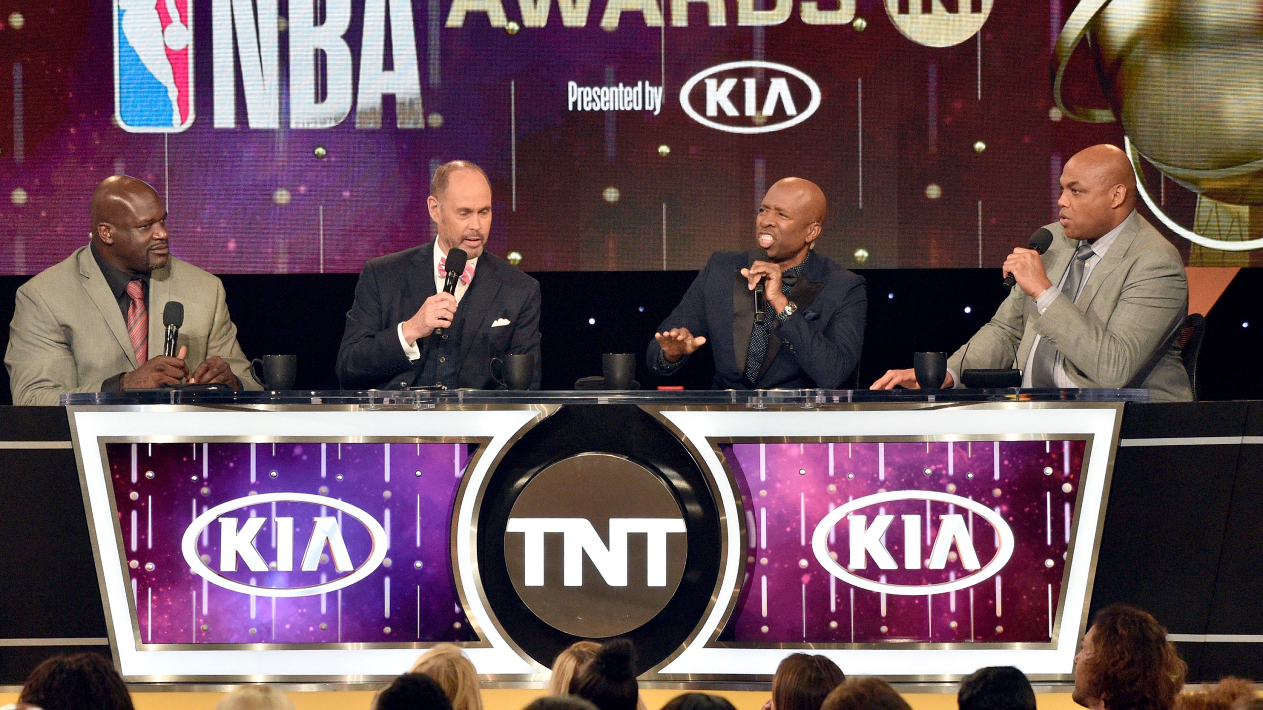 FILE - Shaquille O'Neal, from left, Ernie Johnson, Kenny Smith and Charles Barkley speak at the NBA Awards on Monday, June 25, 2018, at the Barker Hangar in Santa Monica, Calif. (Photo by Chris Pizzello/Invision/AP, File)
