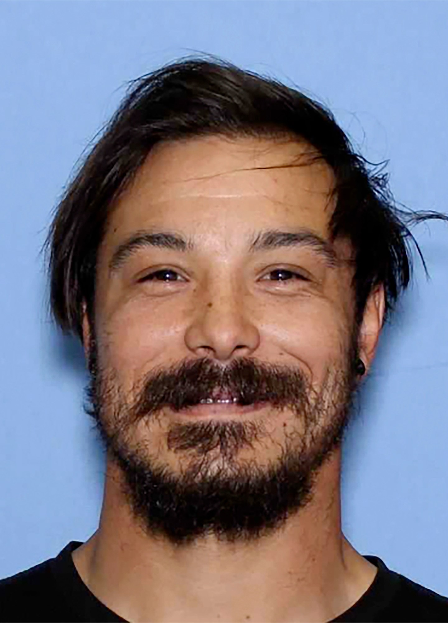 This undated photo provided by the Wenatchee Police Department shows Travis Caleb Decker who the police are asking the public for help in locating the Washington state father who is wanted for murder after his three young daughters were reported missing and then found dead. (Wenatchee Police Department via AP)