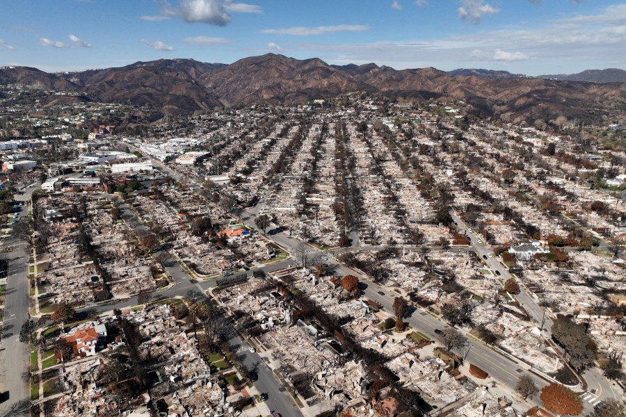 FILE - The devastation from the Palisades Fire is seen in an aerial view in the Pacific Palisades neighborhood of Los Angeles, Monday, Jan. 27, 2025. (AP Photo/Jae C. Hong, File)