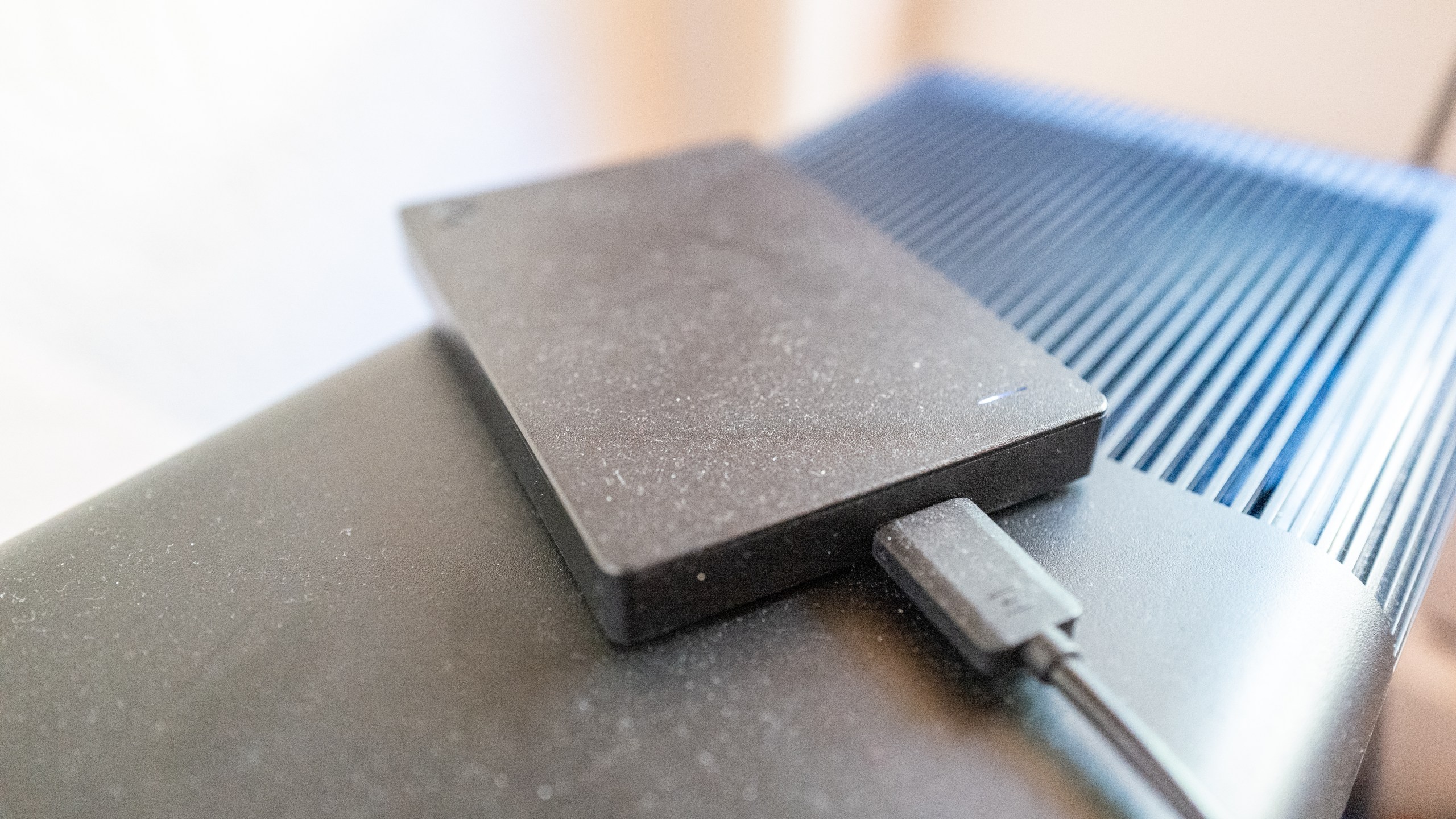 A Seagate miniature external hard drive atop a computer in Lafayette, California, January 20, 2022. (Getty Images)