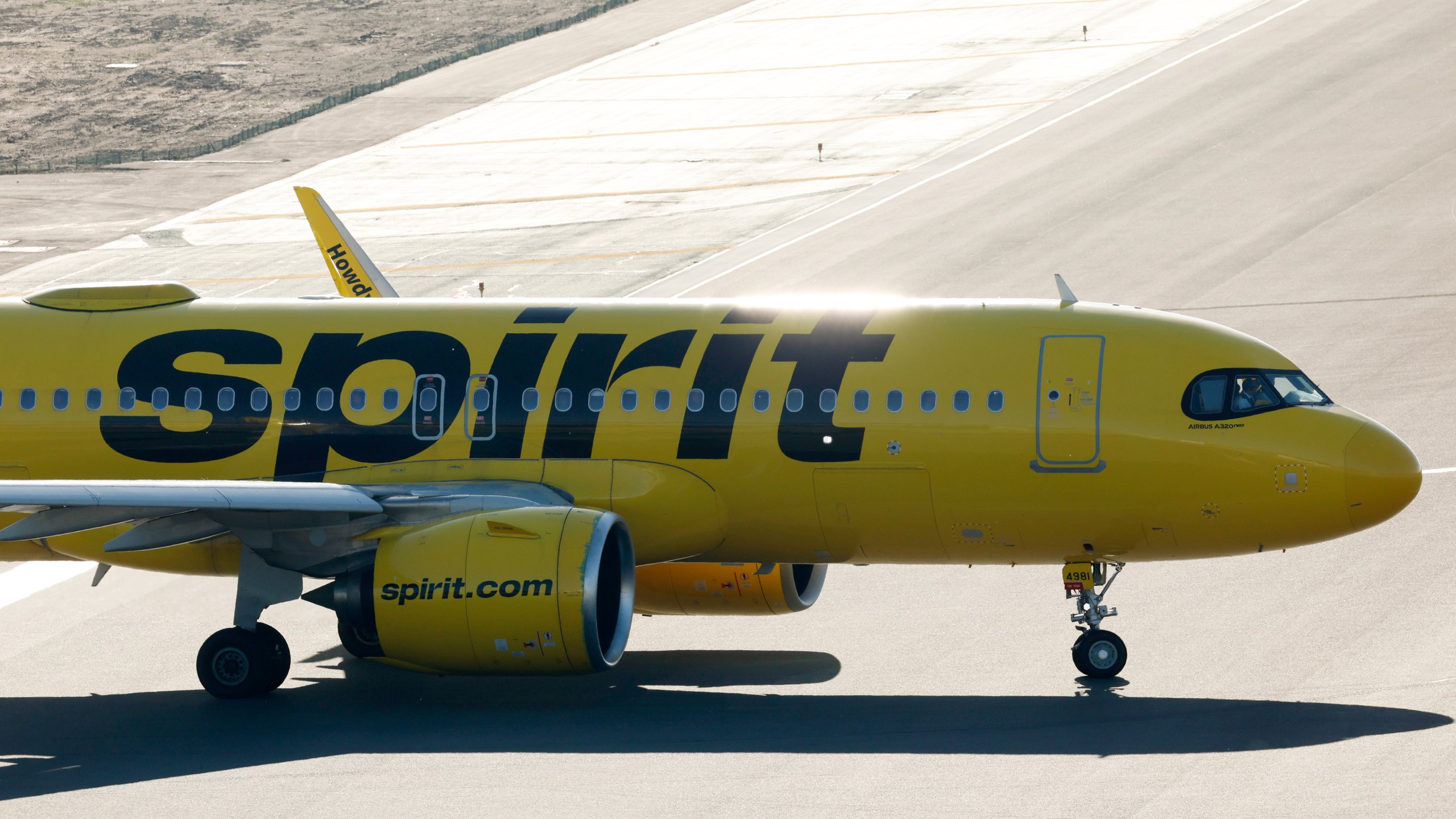 A Spirit Airlines Airbus A320 airplane taxis a California runway. The airline was forced to evacuate an LAX-bound flight from Detroit June 5th, due to a bomb threat. (Photo by Kevin Carter/Getty Images)