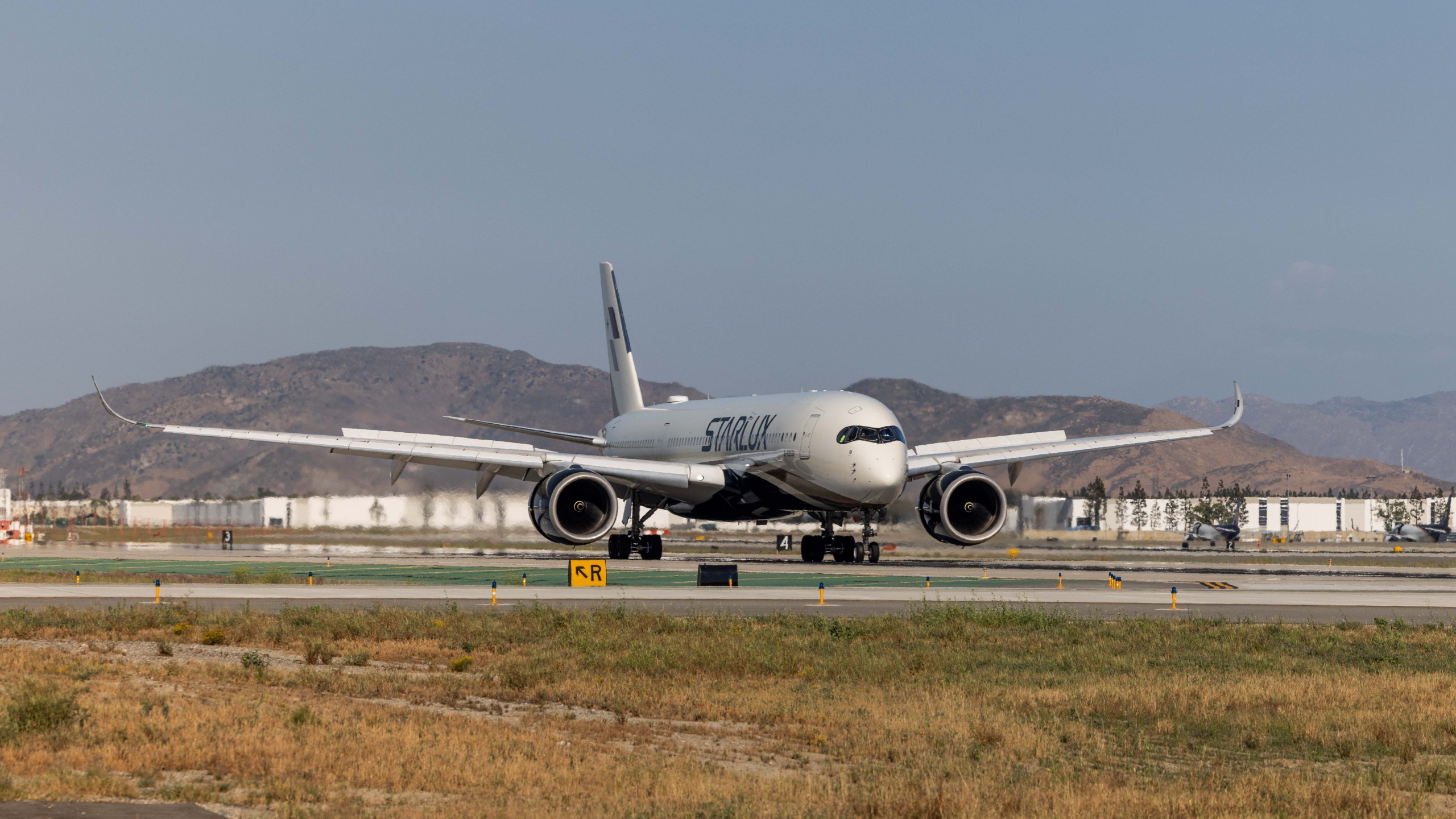 A STARLUX Airbus A350-900 is welcomed to Ontario International Airport with a water cannon upon landing as the airline and airport celebrated the inaugural flight between Ontario and Taipei on June 2, 2025. (STARLUX Airlines)