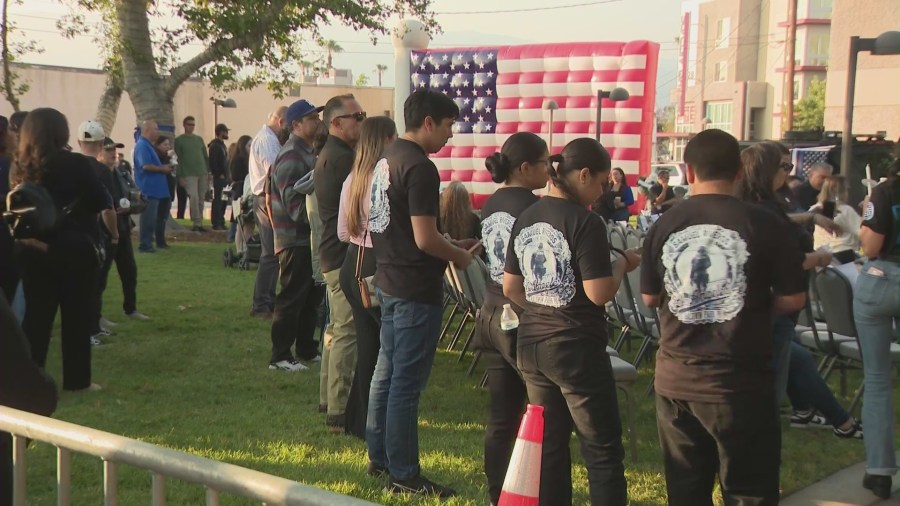 Loved ones, colleagues and community members gathered for a candlelight vigil to honor the life of Officer Samuel Riveros outside Baldwin Park City Hall on June 6, 2025. (KTLA)