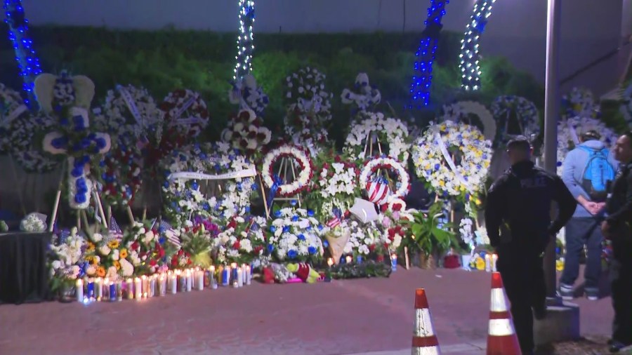 Loved ones, colleagues and community members gathered for a candlelight vigil to honor the life of Officer Samuel Riveros outside Baldwin Park City Hall on June 6, 2025. (KTLA)