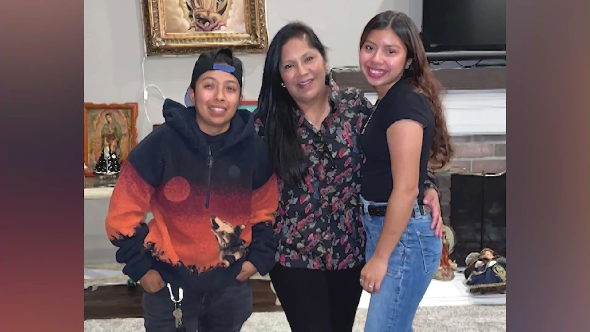 Maria Valeriano Perez, 52, is seen with two of her children in family photo.