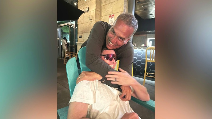 Alex Olmedo II and his son are seen in a family photo.