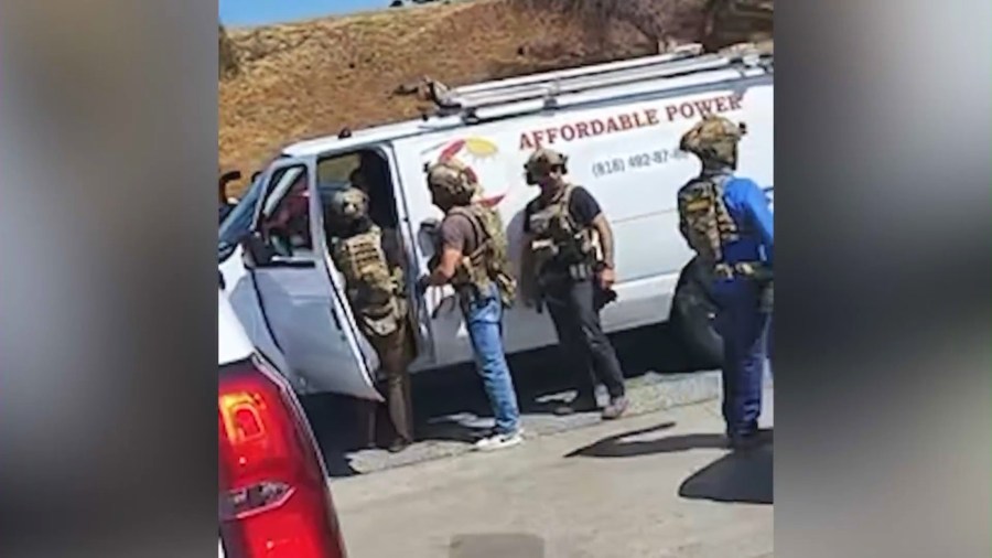 Arturo Hermosillo being forcefully removed from his van for allegedly filming a federal immigration raid at a shopping plaza in Pacoima on June 19, 2025.