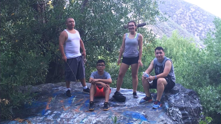 Manuel Contreras (on left) is seen with his three children. (Contreras Family)