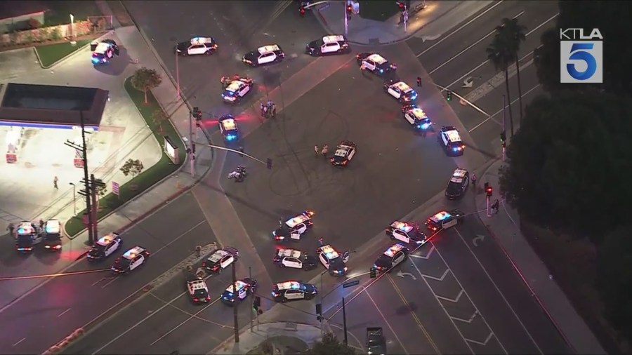 Federal officers created a skirmish line to push back protestors gathered in downtown Los Angeles on Saturday night over ICE raids happening in SoCal. Gil Leyvas reports from Sky5 on June 7, 2025. (KTLA)