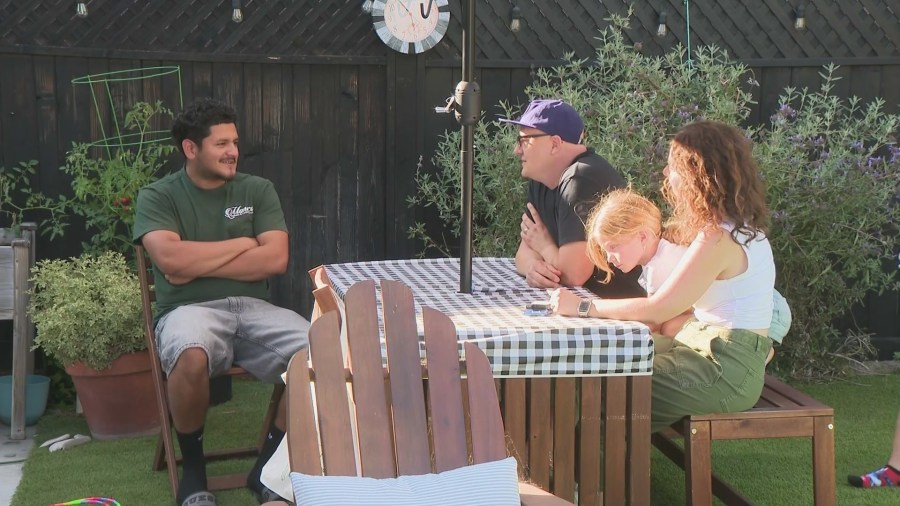 Jonathan Chavez, (left) speaks with Alex Meiners and Mia Hopkey (right) in Burbank. (KTLA)