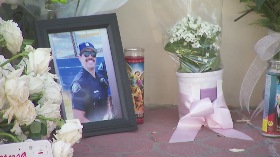 Loved ones, colleagues and community members gathered for a candlelight vigil to honor the life of Officer Samuel Riveros outside Baldwin Park City Hall on June 6, 2025. (KTLA)