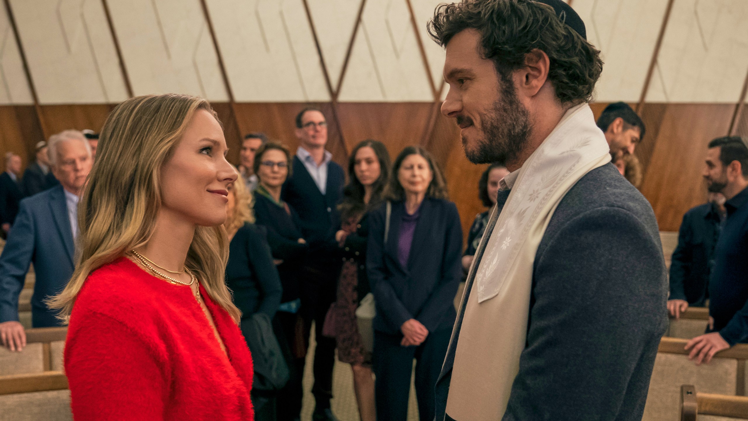 This image released by Netflix shows Kristen Bell, left, and Adam Brody in a scene from "Nobody Wants This." (Stefania Rosini/Netflix via AP)