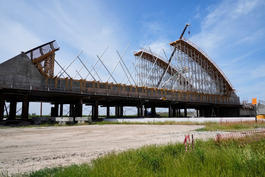 FILE - The Tied Arch Bridge construction site, which will take high-speed trains over State Route 43, April 15, 2025, in Fresno County, Calif. (AP Photo/Godofredo A. Vásquez, File)