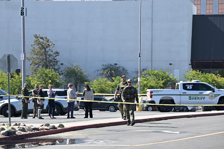 Police respond to a shooting outside the Grand Sierra Resort in Reno, Nev., Monday, July 28, 2025. (AP Photo/Andy Barron)