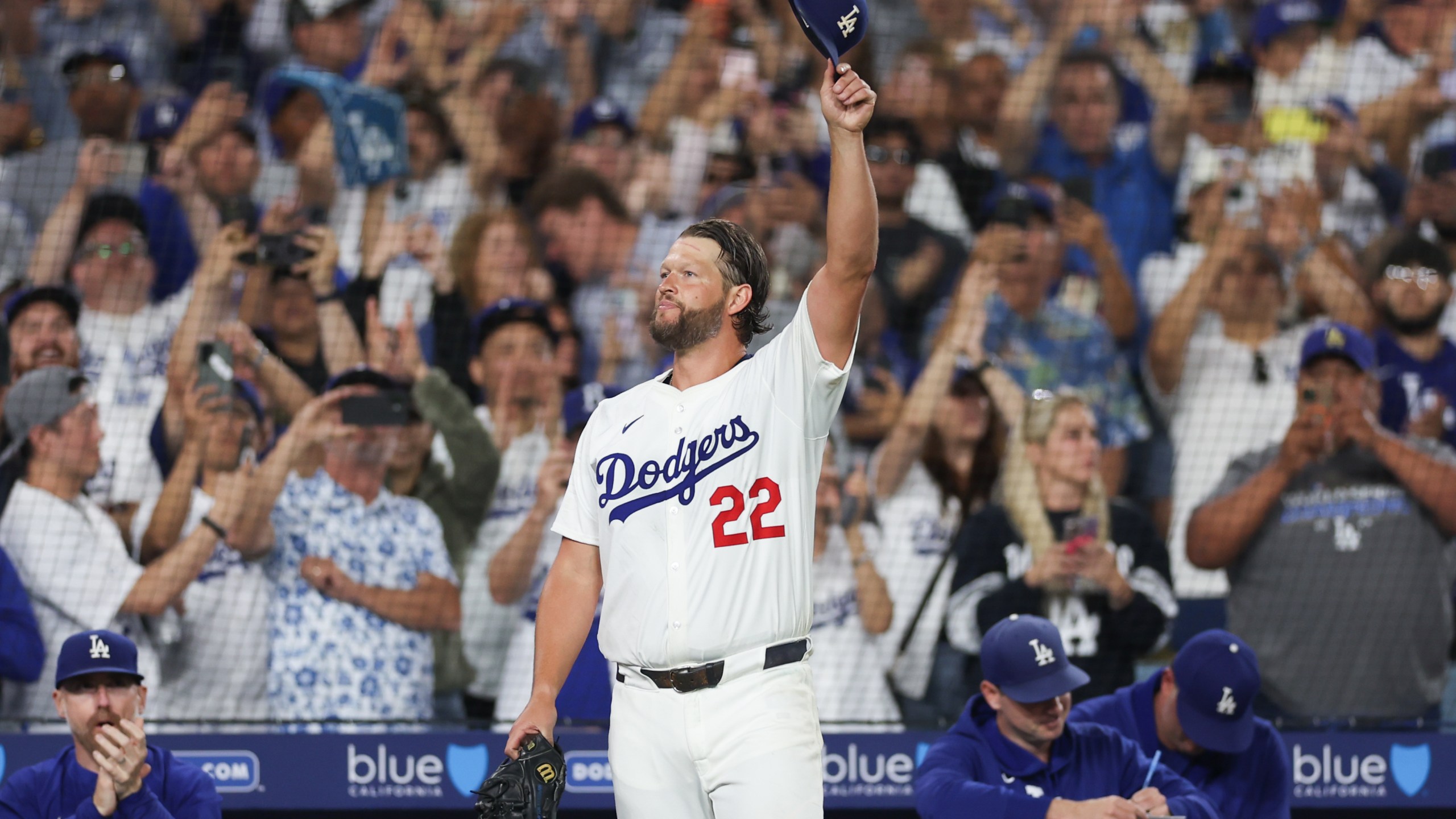 Clayton Kershaw #22 of the Los Angeles Dodgers salutes the crowd after delivering the 3000th strikeout of his career in the sixth inning during the game between the Chicago White Sox and the Los Angeles Dodgers at Dodger Stadium on Wednesday, July 2, 2025 in Los Angeles, California. Kershaw is now the 20th member of the 3,000-strikeout club, and is only the fourth left-handed pitcher to have struck out 3,000 or more batters in their career. (Photo by Katelyn Mulcahy/MLB Photos via Getty Images)