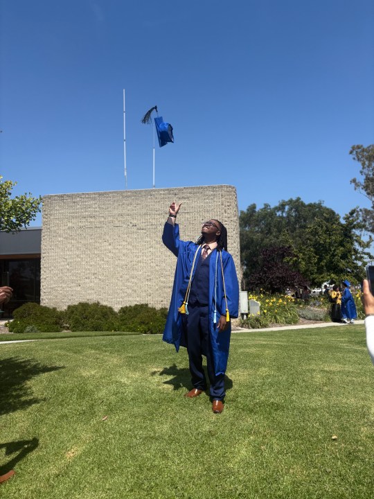 Ean, a 17-year-old graduate of a Los Angeles online public school celebrates graduating a year early in June 2025.