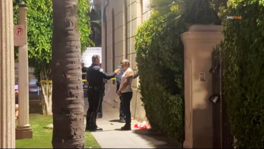 Police were seen performing a breathalyzer test on the suspect before handcuffing him and placing him into a patrol vehicle after a deadly crash in L.A.’s Koreatown neighborhood on July 31, 2025. (RMG)