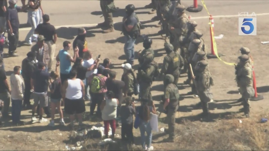 A growing crowd of protesters gathered at a Camarillo agriculture farm after several workers were detained in an immigration enforcement operation on July 10, 2025. (KTLA)