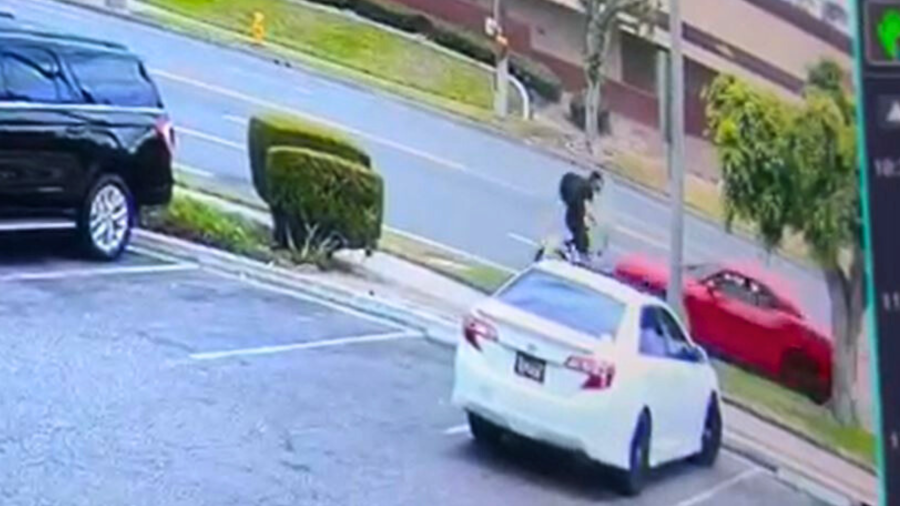 Surveillance video captured the moment a suspect in a Dodge Challenger struck a bicyclist head-on in Fullerton on July 22, 2025. (Fullerton Police Department)