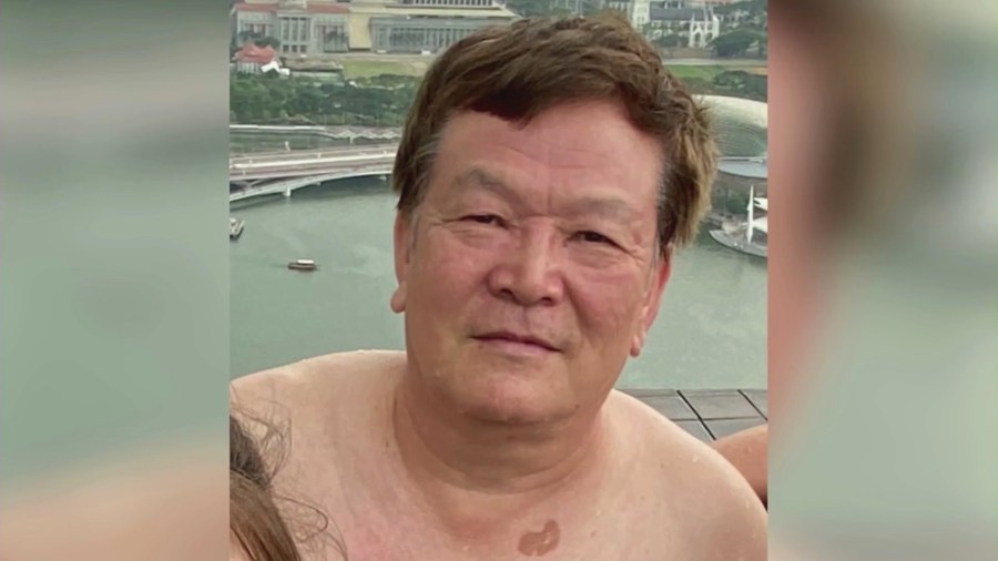 Naiping Hou has a distinct birthmark on his upper chest, near his left shoulder area. (Hou Family)