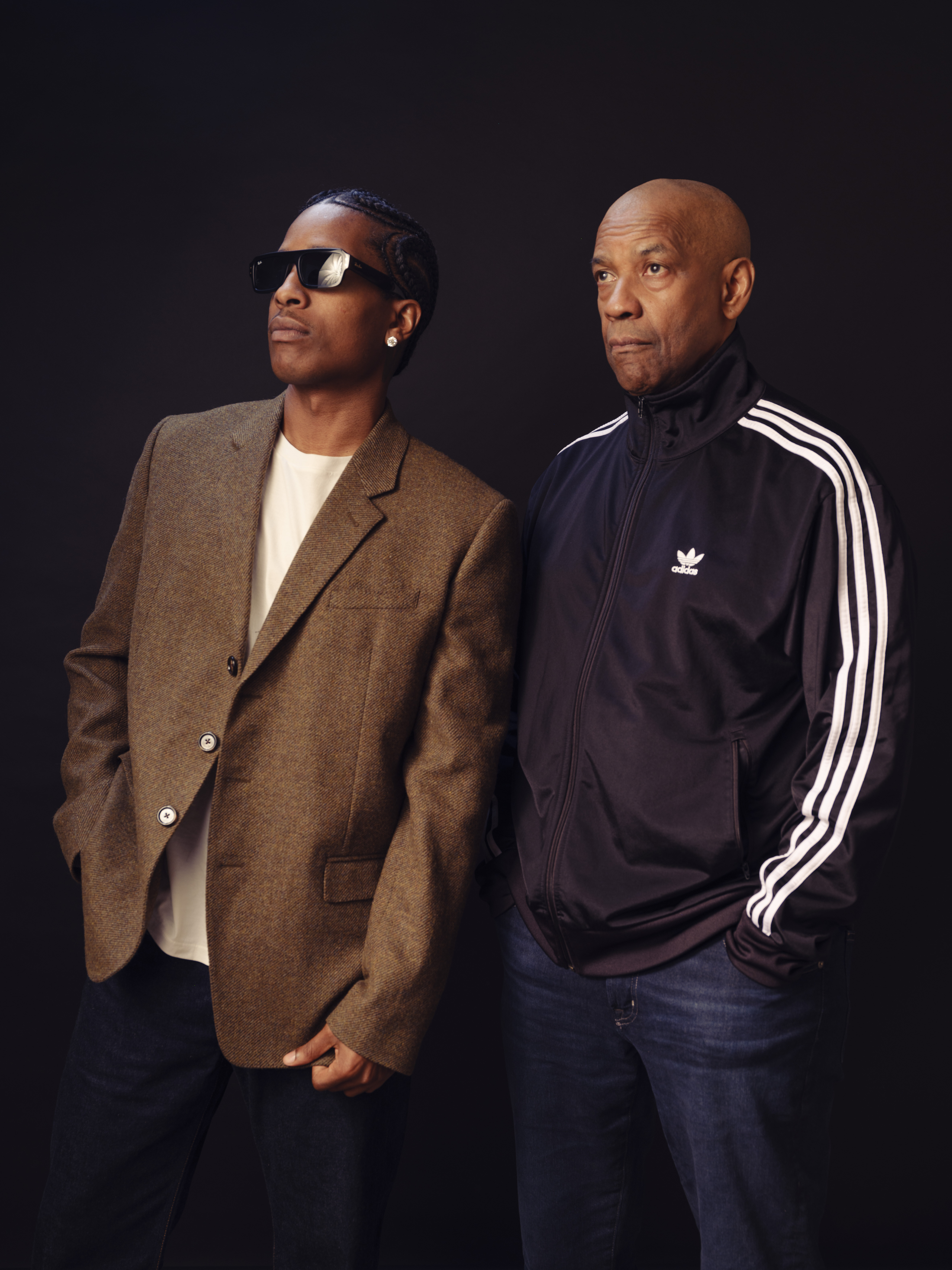 A$AP Rocky, left, and Denzel Washington pose for a portrait to promote "Highest 2 Lowest" on Sunday, Aug. 10, 2025, in New York. (Photo by Drew Gurian/Invision/AP)