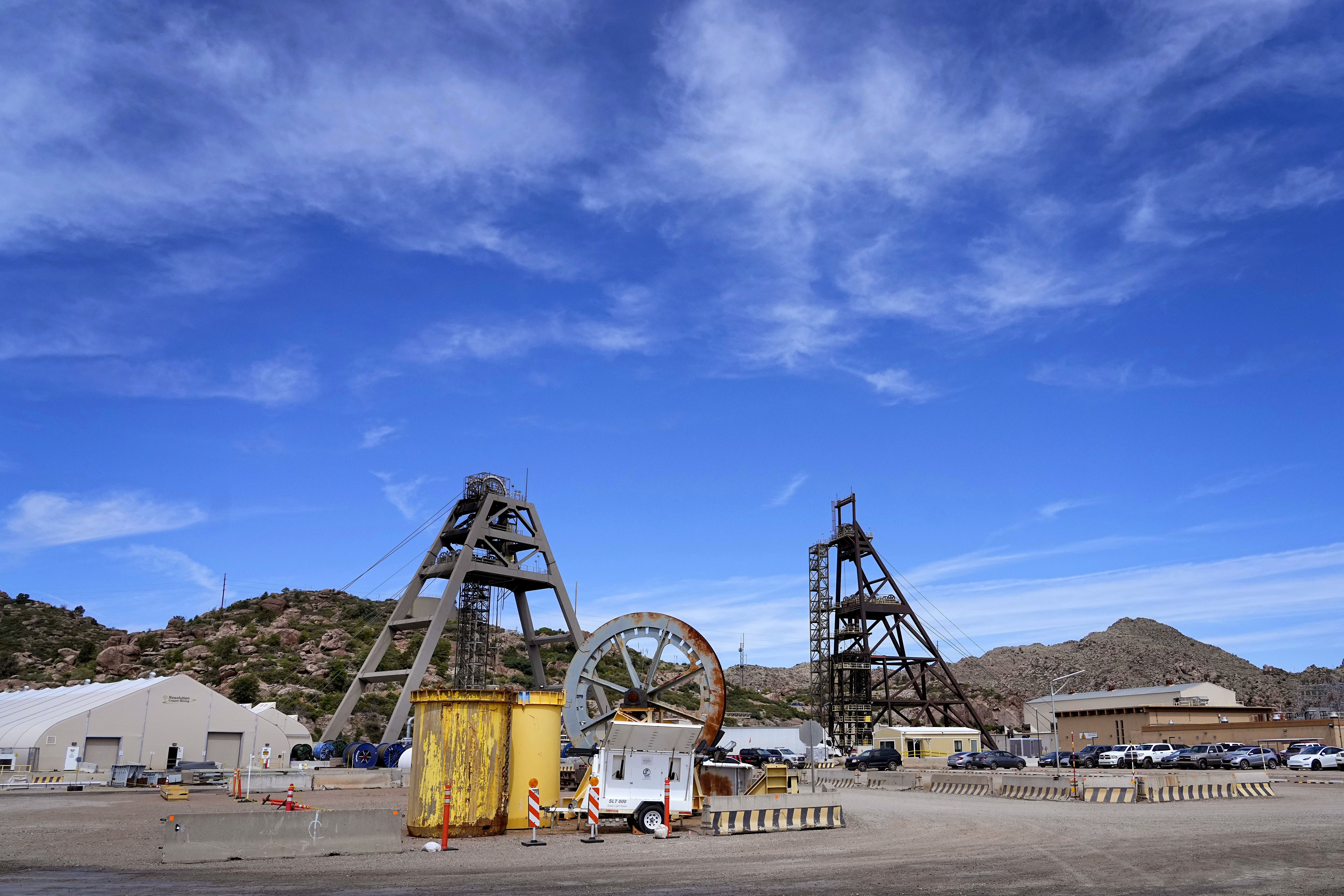 FILE - Mine shafts 10, left, and 9, right, tower over the Resolution Copper Mining Company facility, June 9, 2023, in Miami, Ariz. (AP Photo/Matt York, File)