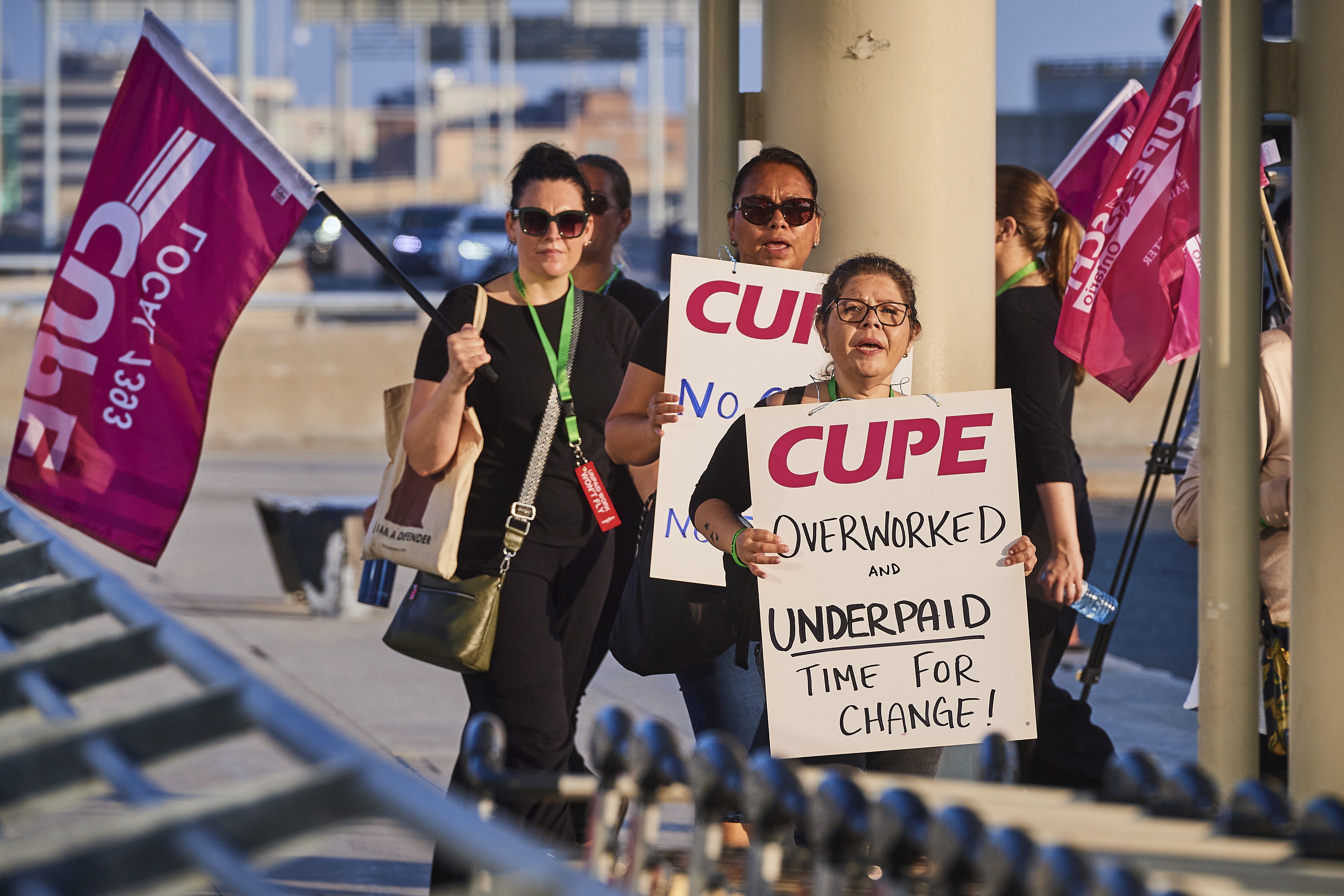 Air Canada flight attendants picket at Pearson International Airport in Toronto on Saturday, Aug. 16, 2025. (Sammy Kogan/The Canadian Press via AP)
