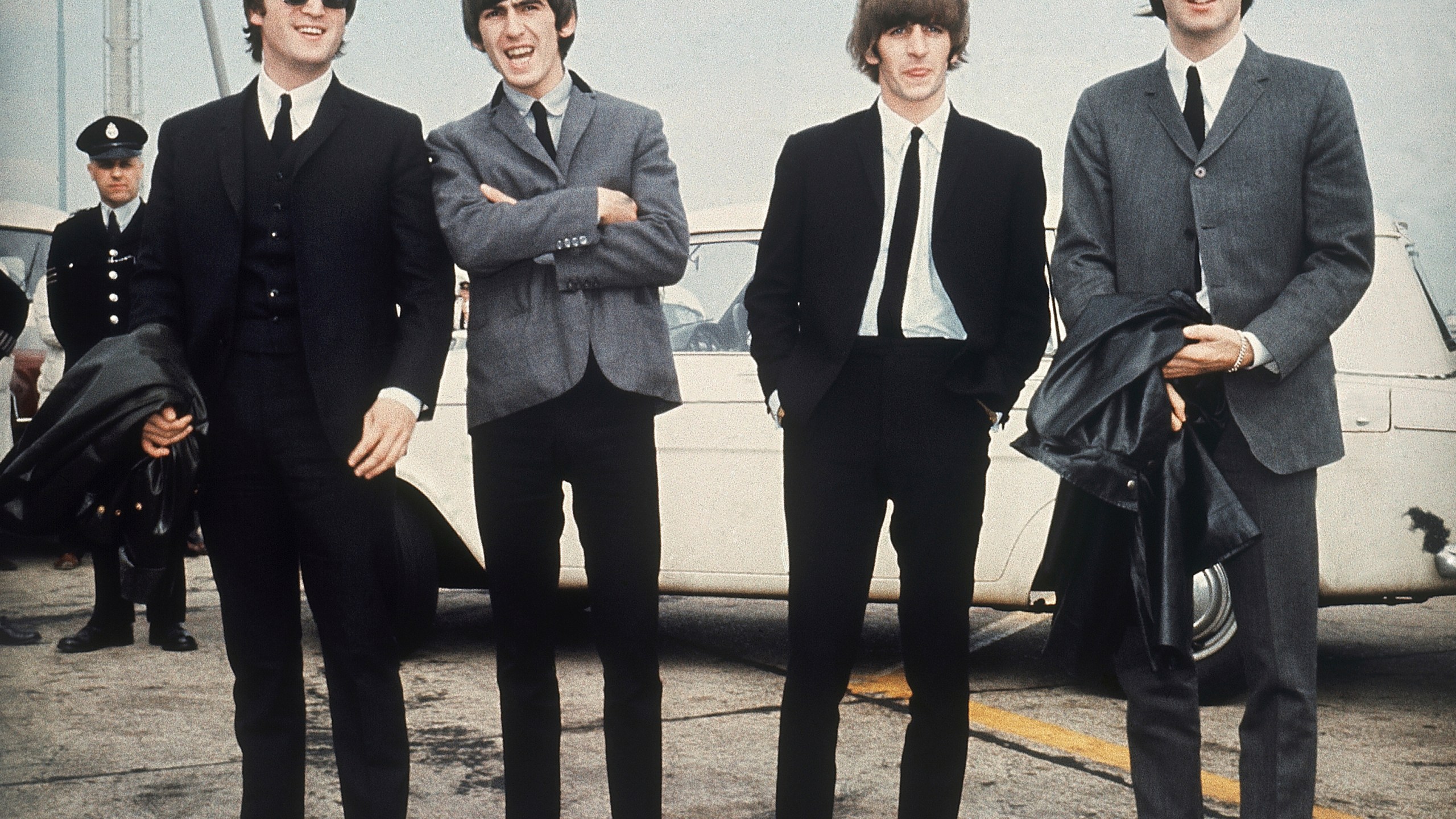 FILE - The Beatles, from left, John Lennon, George Harrison, Ringo Starr and Paul McCartney arrive in Liverpool, England, July 10, 1964. (AP Photo, File)
