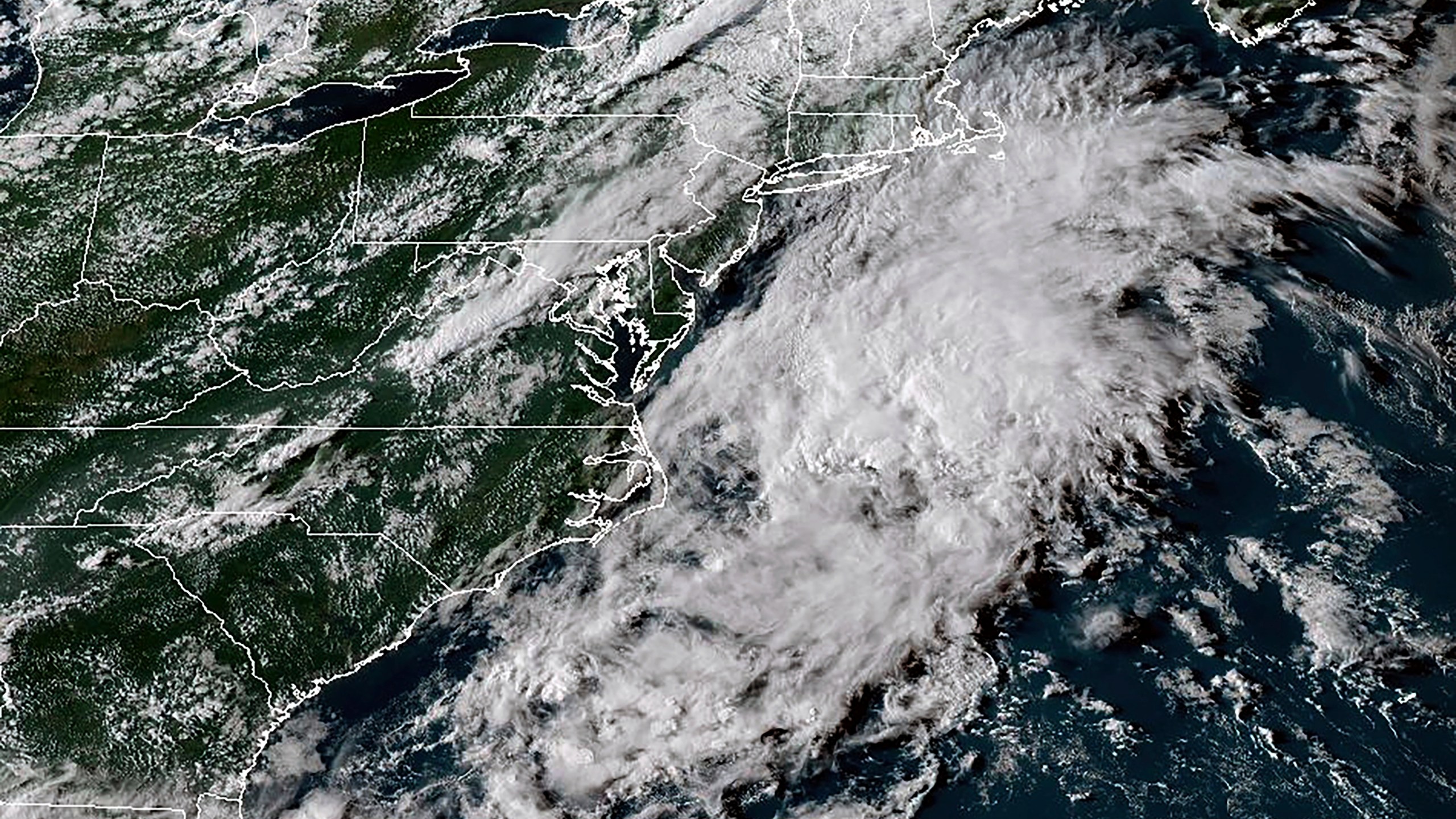 This satellite image proved by the National Oceanic and Atmospheric Administration (NOAA) shows Tropical Storm Fernand in the Atlantic off the east coast of the U.S. on Sunday, Aug. 24, 2025. (NOAA via AP)