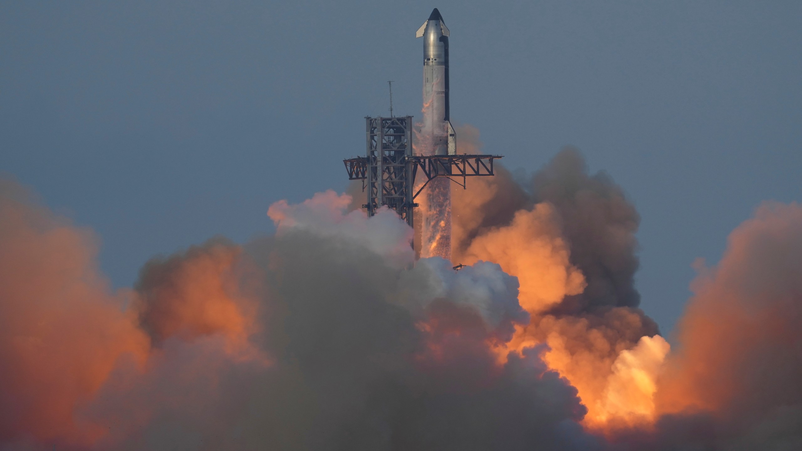 SpaceX's mega rocket Starship launches during a test flight from Starbase, Texas, Tuesday, Aug. 26, 2025. (AP Photo/Eric Gay)