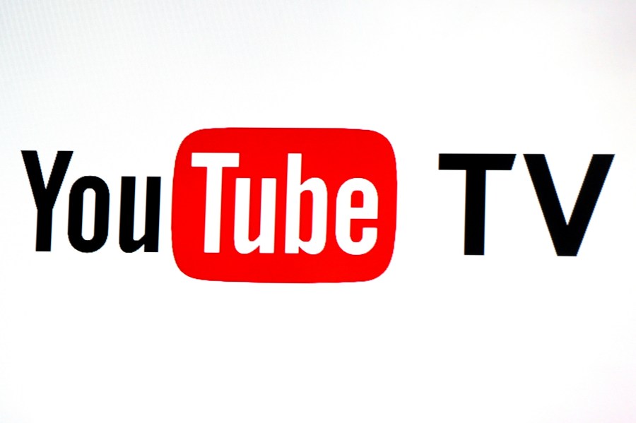 FILE - YouTube TV logo is seen at the YouTube Space LA in Los Angeles, Feb. 28, 2017. (AP Photo/Reed Saxon, File)