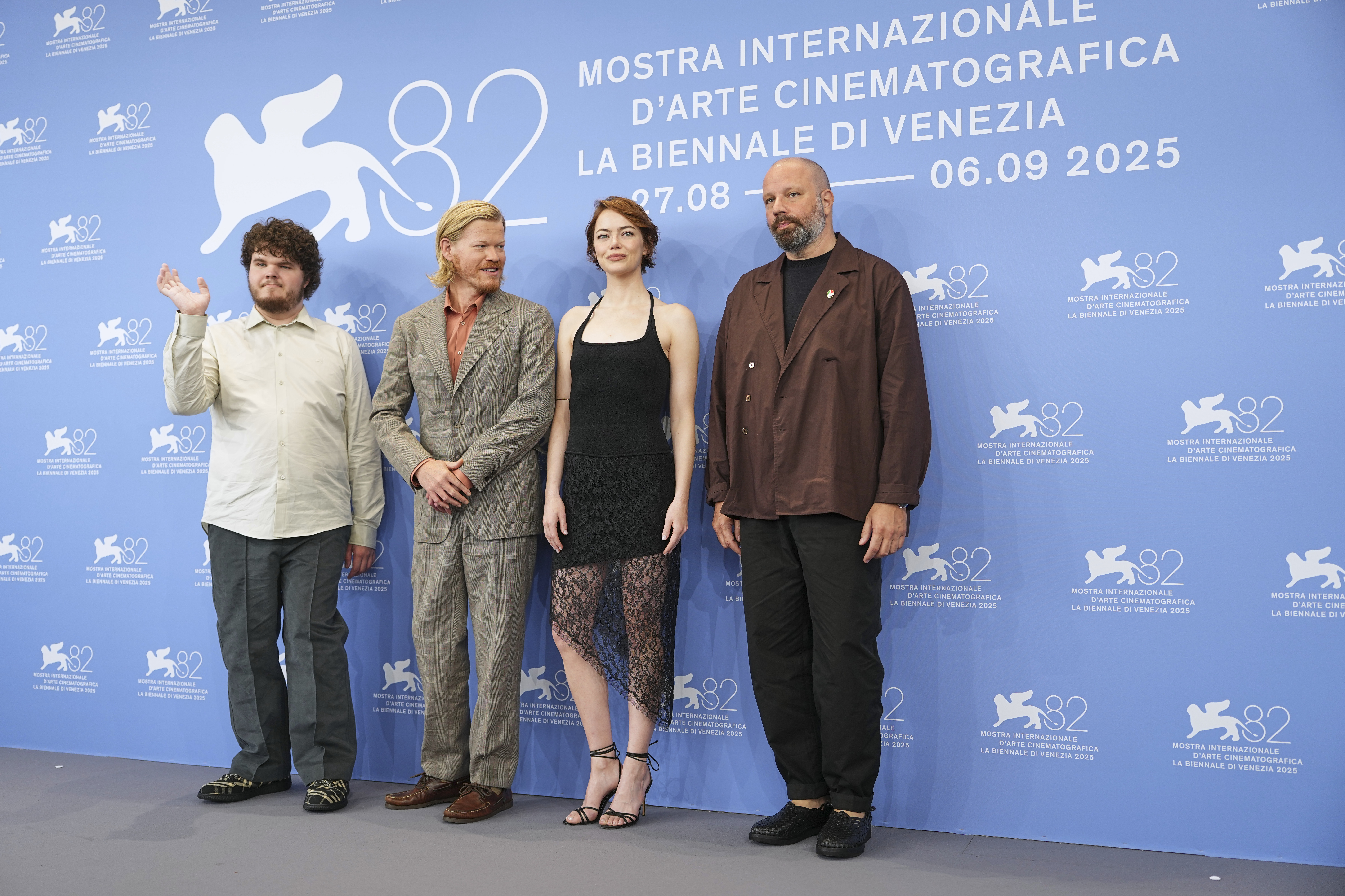 Aidan Delbis, from left, Jesse Plemons, Emma Stone and director Yorgos Lanthimos pose for photographers at the photo call for the film 'Bugonia' during the 82nd edition of the Venice Film Festival in Venice, Italy, on Thursday, Aug. 28, 2025. (Photo by Scott A Garfitt/Invision/AP)