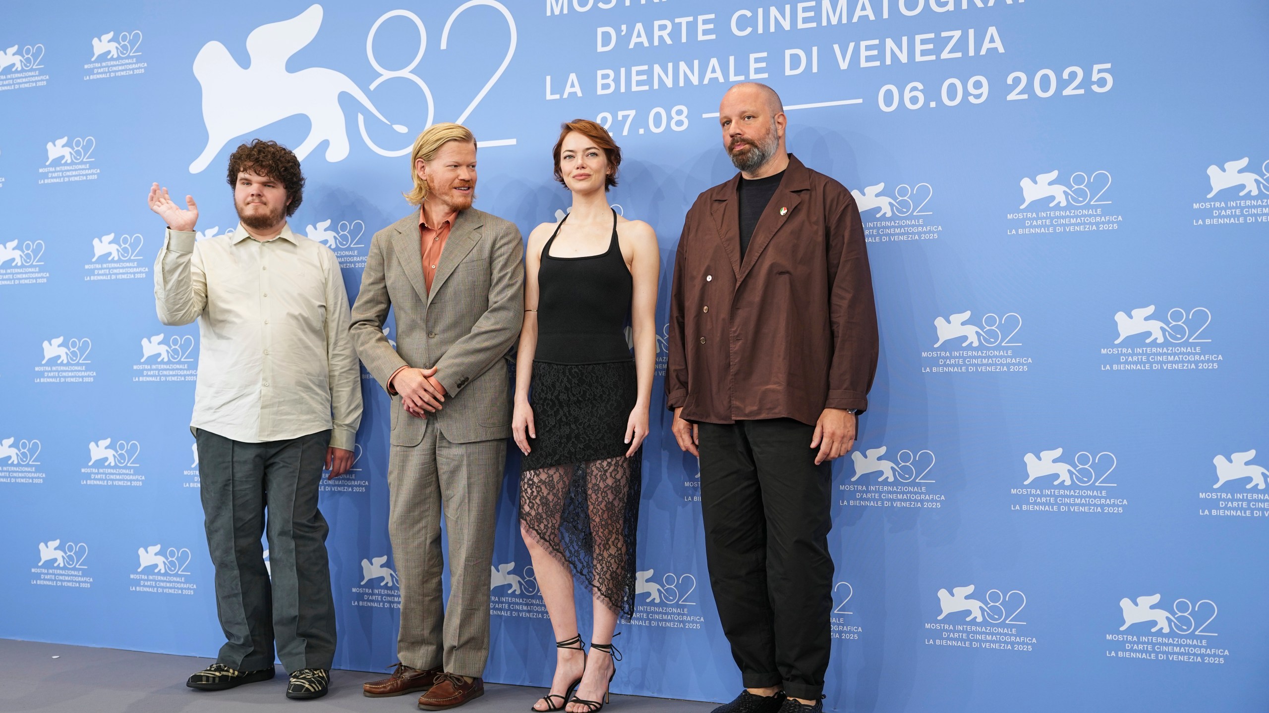 Aidan Delbis, from left, Jesse Plemons, Emma Stone and director Yorgos Lanthimos pose for photographers at the photo call for the film 'Bugonia' during the 82nd edition of the Venice Film Festival in Venice, Italy, on Thursday, Aug. 28, 2025. (Photo by Scott A Garfitt/Invision/AP)