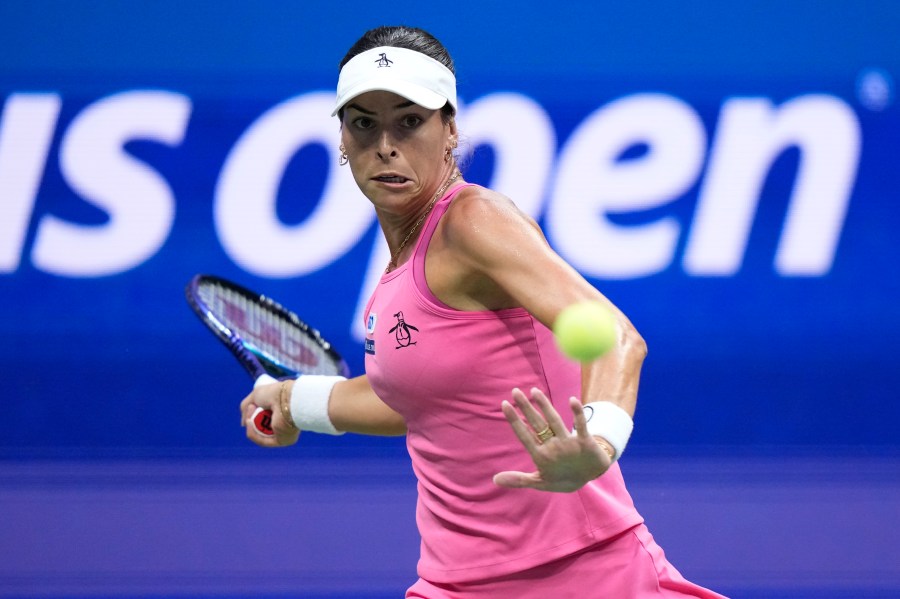 Ajla Tomljanovic, of Australia, returns a shot to Coco Gauff, of the United States, during the first round of the U.S. Open tennis championships, Tuesday, Aug. 26, 2025, in New York. (AP Photo/Frank Franklin II)