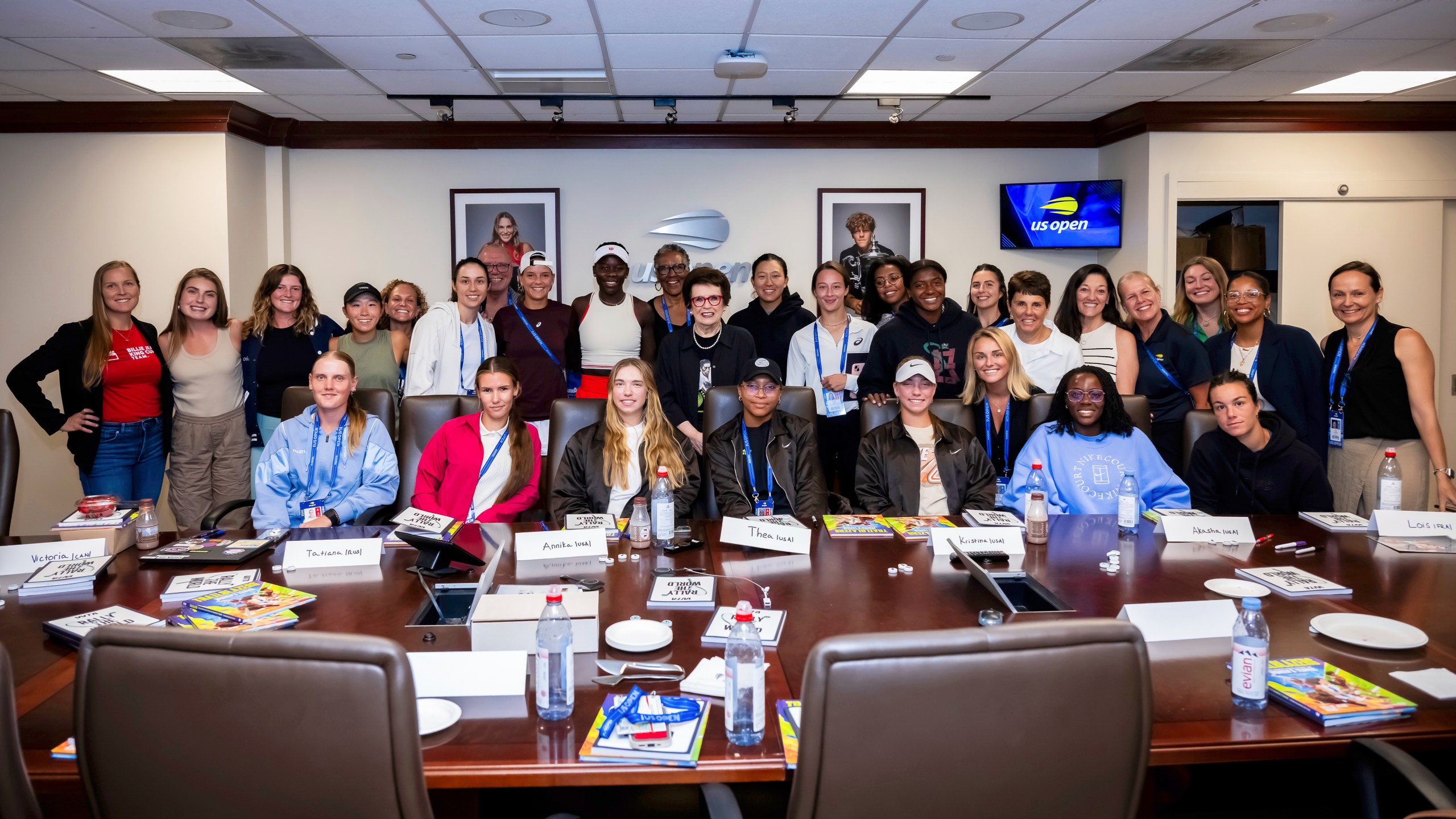 In this image provided the WTA, Billie Jean King poses with a group of current and former WTA players, Friday, Aug. 22, 2025, at the USTA Billie Jean King National Tennis Center in New York. (WTA via AP)