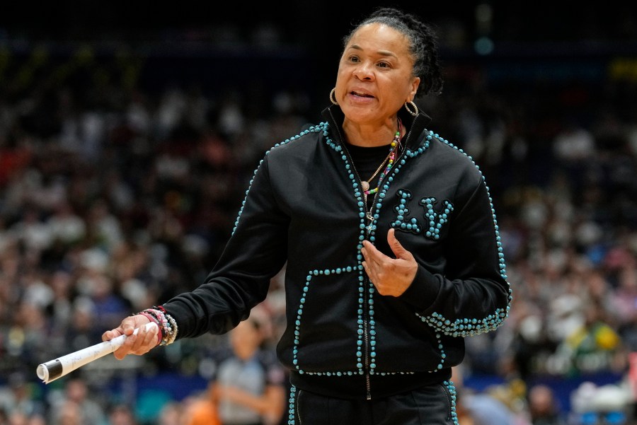 FILE - South Carolina head coach Dawn Staley reacts during the first half of the national championship game against UConn at the Final Four of the women's NCAA college basketball tournament, April 6, 2025, in Tampa, Fla. (AP Photo/Chris O'Meara, File)