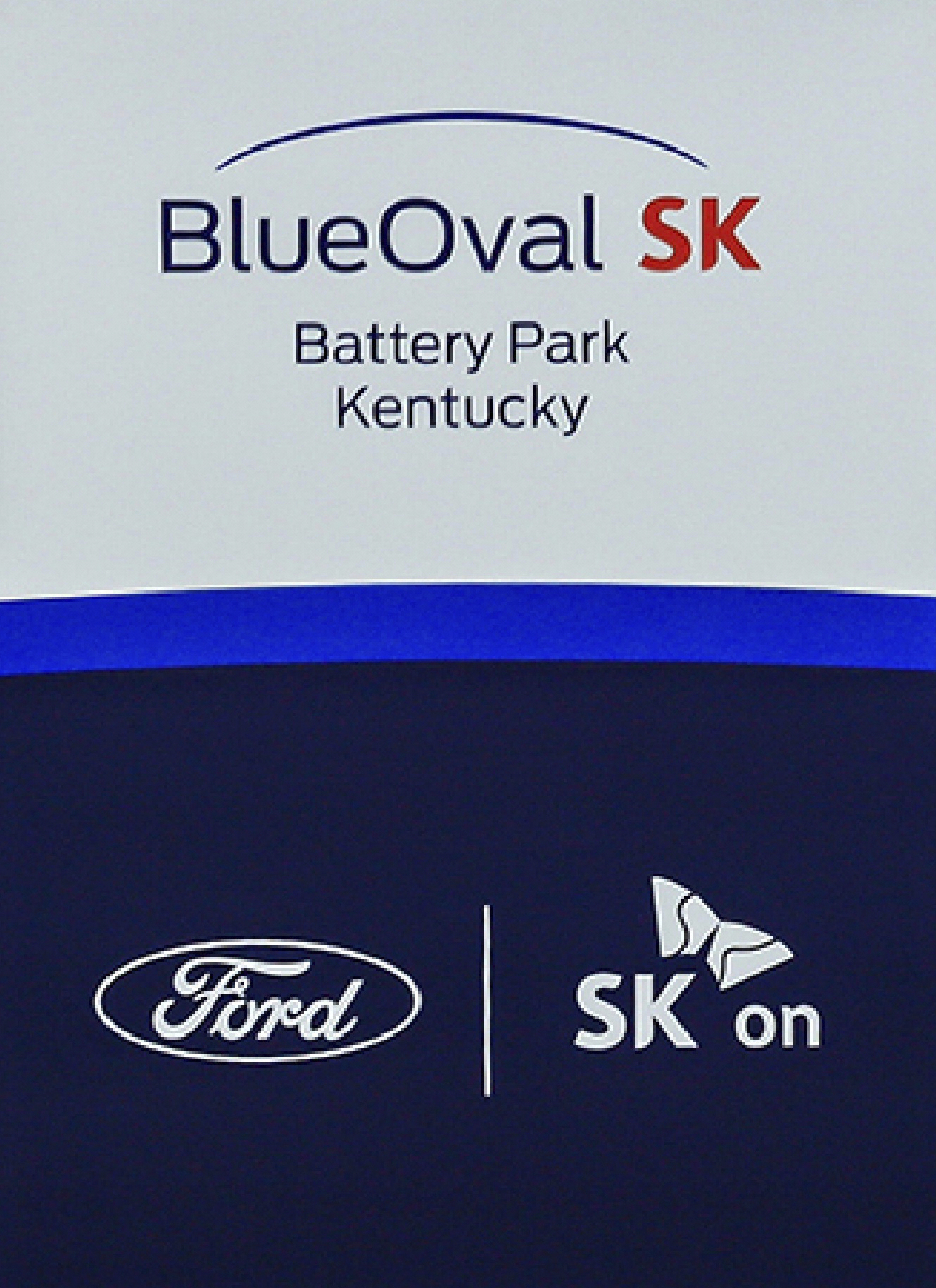 FILE - Logos for BlueOval SK and Ford are displayed on a podium during a celebration for the progress of the BlueOval SK Battery Park in Glendale, Ky., Dec. 5, 2022. (Gina Clear/The News-Enterprise via AP)