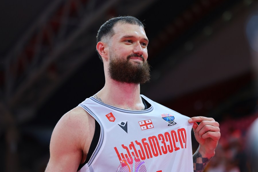 Georgia's Alexander Mamukelashvili celebrates after his team won Spain during the Eurobasket, European Basketball Championship Group C match between Spain and Georgia at the Spyros Kyprianou Arena in Limassol, Cyprus, Thursday, Aug. 28, 2025. (AP Photo/Chara Savvidou)