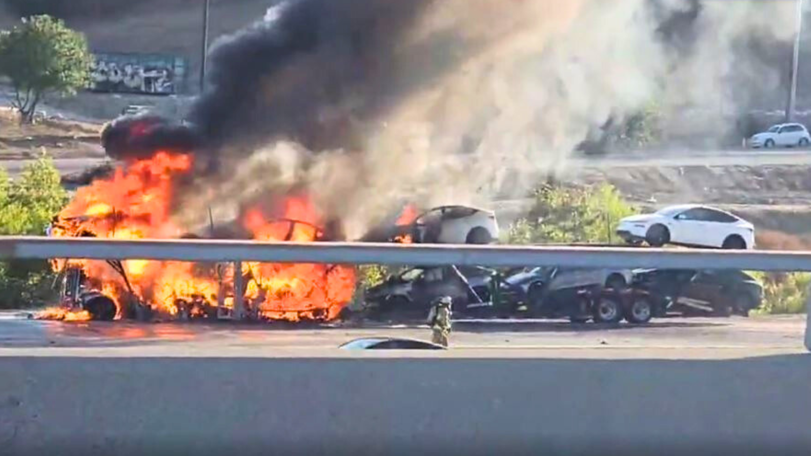 Roads on the 5 Freeway in Sylmar were shut down after a tractor-trailer carrying Tesla vehicles was engulfed in flames on Aug. 16, 2025. (Citizen)