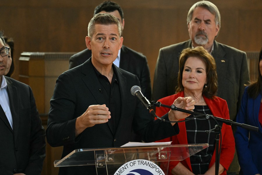 US Secretary of Transportation Sean Duffy speaks over a crowd of boos during a press conference at Union Station in downtown Los Angeles on Feb. 20, 2025. (Getty Images)