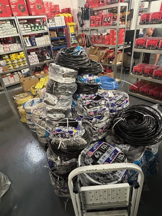 Images shared by the Los Angeles Police Department shows full shelves of allegedly stolen merchandise that were being sold at two local businesses.