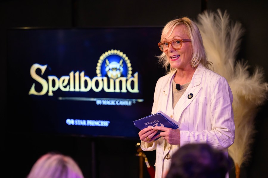 Becky Thomson Foley, Head of Global Entertainment Princess Cruises, announces details of the new Spellbound experiences aboard the Star Princess during a media event on Aug. 14, 2025. (Princess Cruises/the Magic Castle)