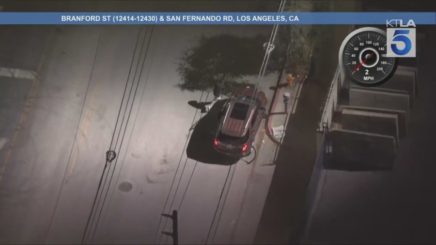 The male suspect ditched the stolen SUV in Pacoima and ran into a warehouse-type building where he barricaded himself on Aug. 12, 2025. (KTLA)