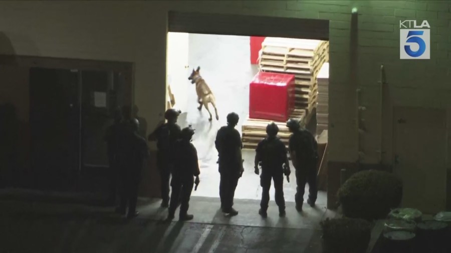 A police K9 was sent into the building to investigate. (KTLA)