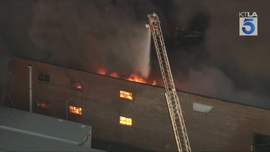 Crews battled a large fire at a commercial building that was reportedly filled with e-bikes in Commerce on Aug. 6, 2025. (KTLA)